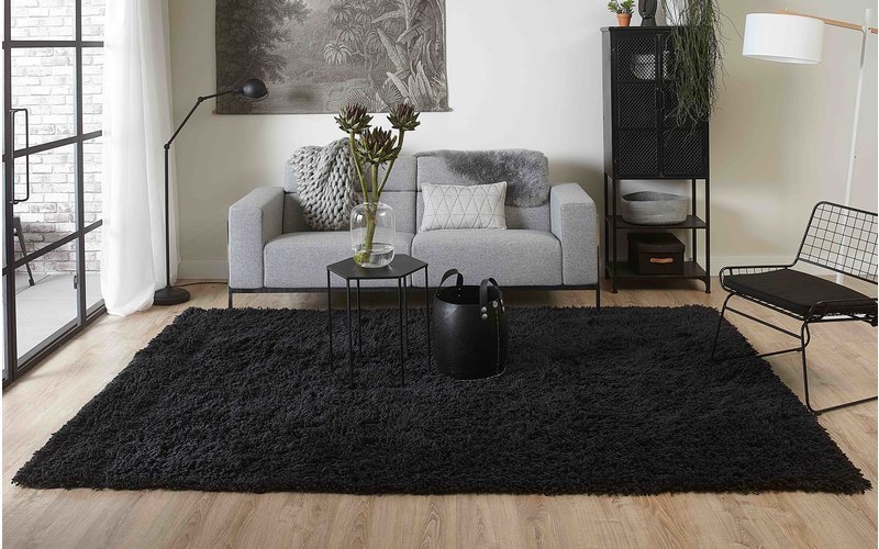 een-karpet-creeert-een-plek-in-de-ruimte een-karpet-creeert-een-plek-in-de-ruimte